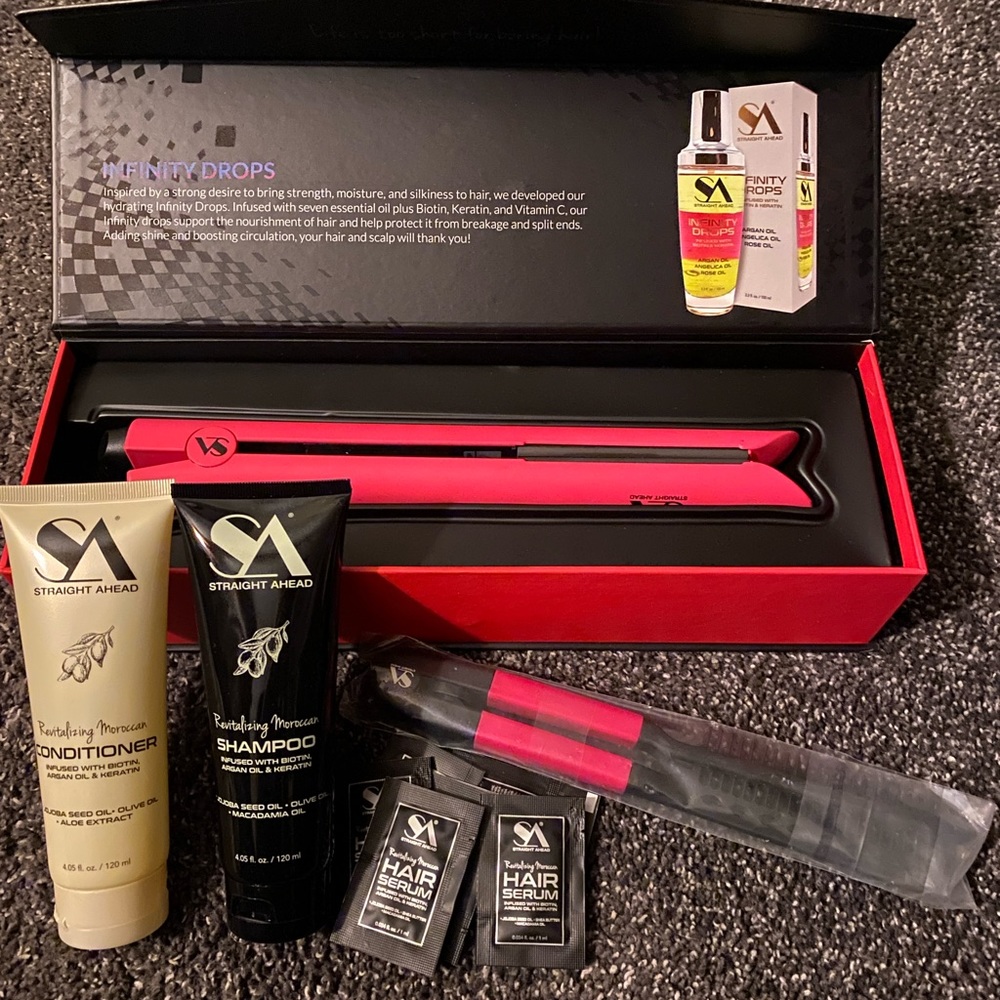 Straight ahead, BIO-ionic flat iron, high end salon grade with comb and products